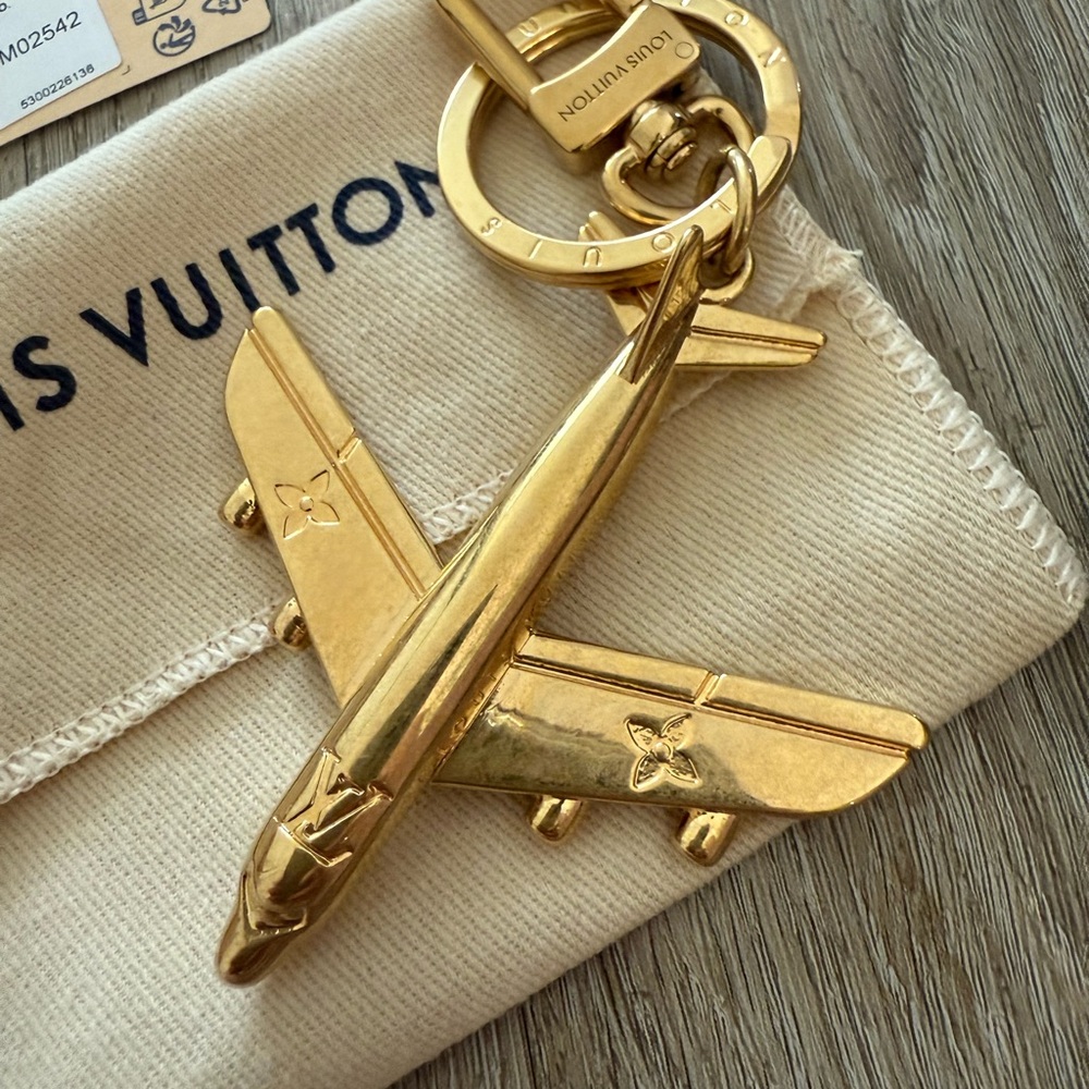 Louis Vuitton plane key holder and bag charm